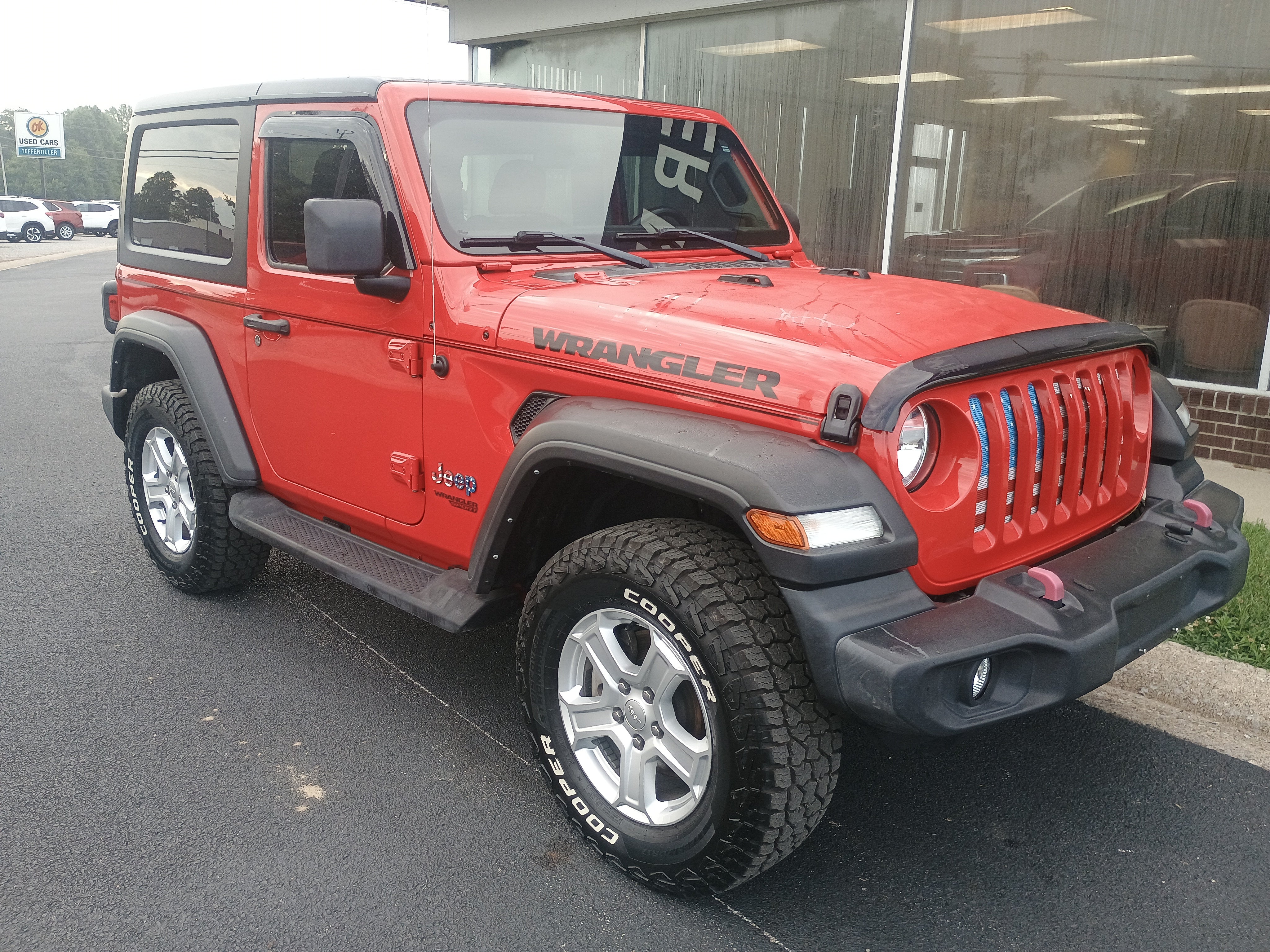 2021 Jeep Wrangler Sport S in Red — front three-quarter view