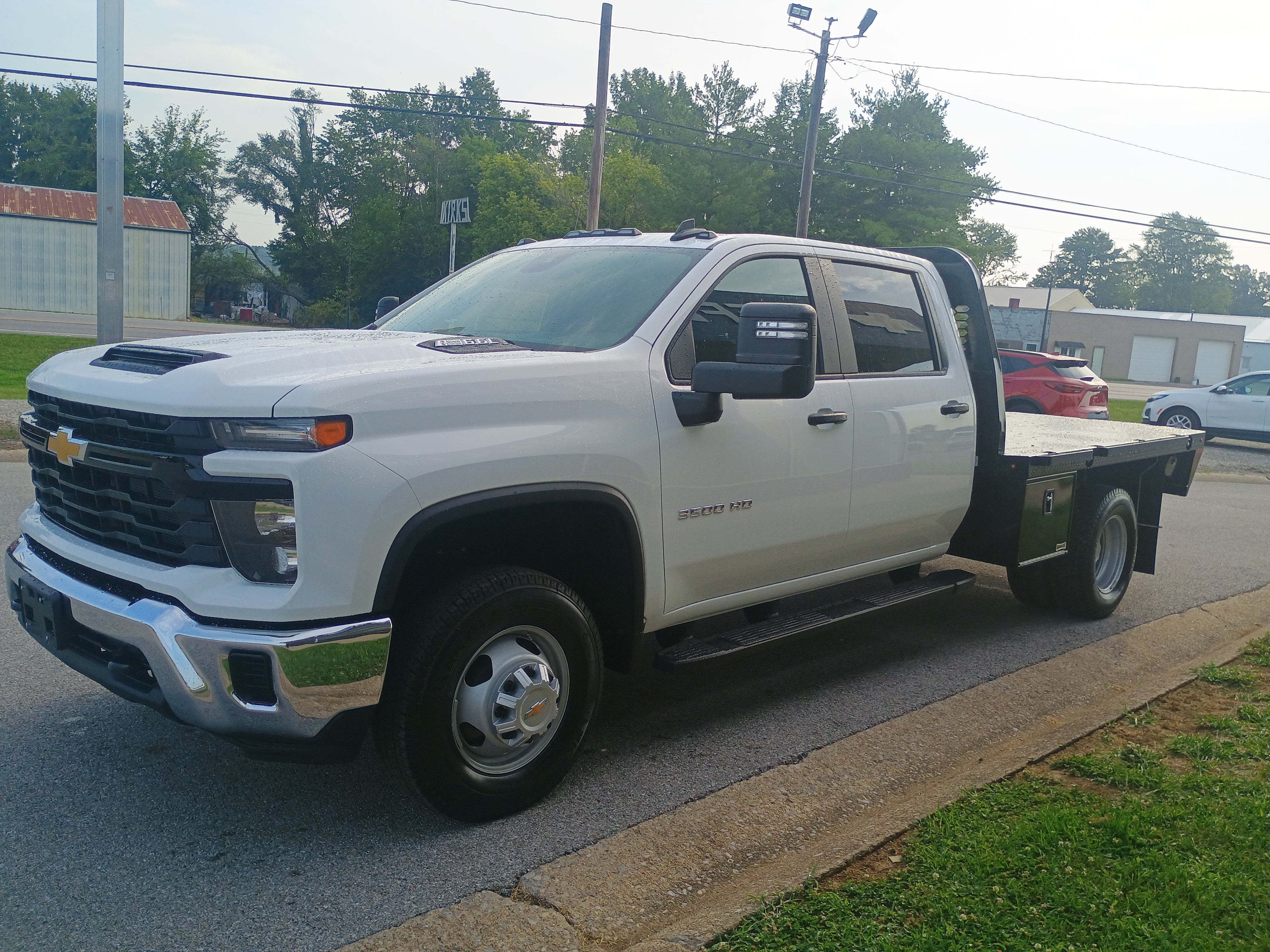 2025 Chevrolet Silverado 3500 HD Chassis Cab Work Truck in Summit White — front three-quarter view