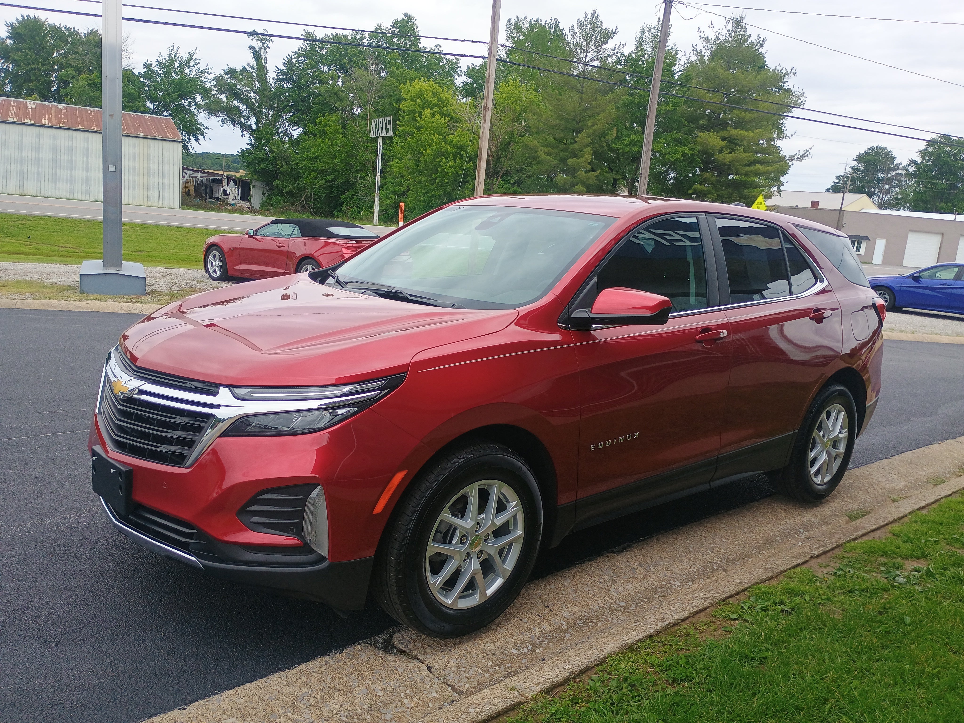 2024 Chevrolet Equinox LT in Radiant Red Tintcoat — front three-quarter view