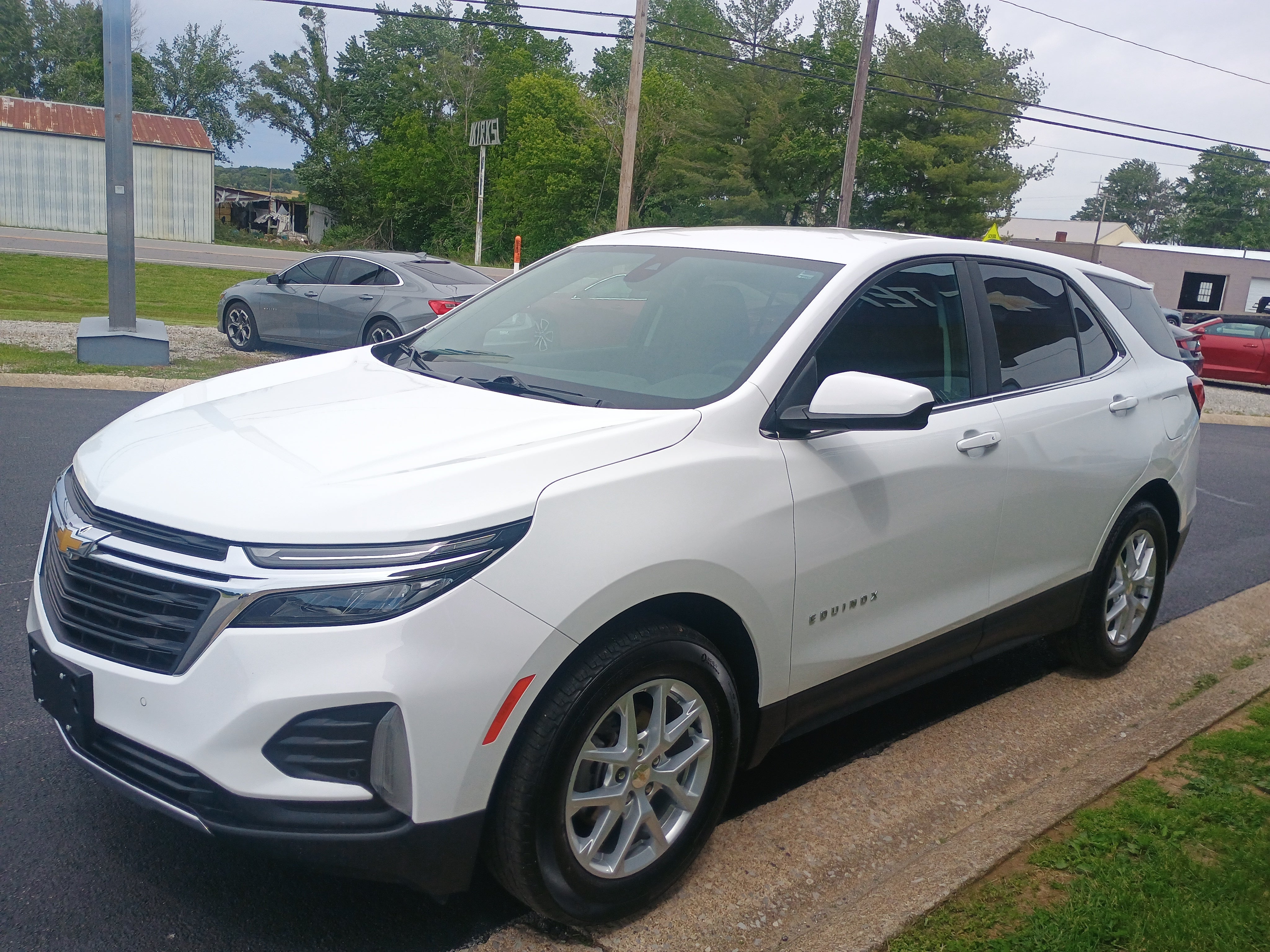 2024 Chevrolet Equinox LT in Summit White — front three-quarter view