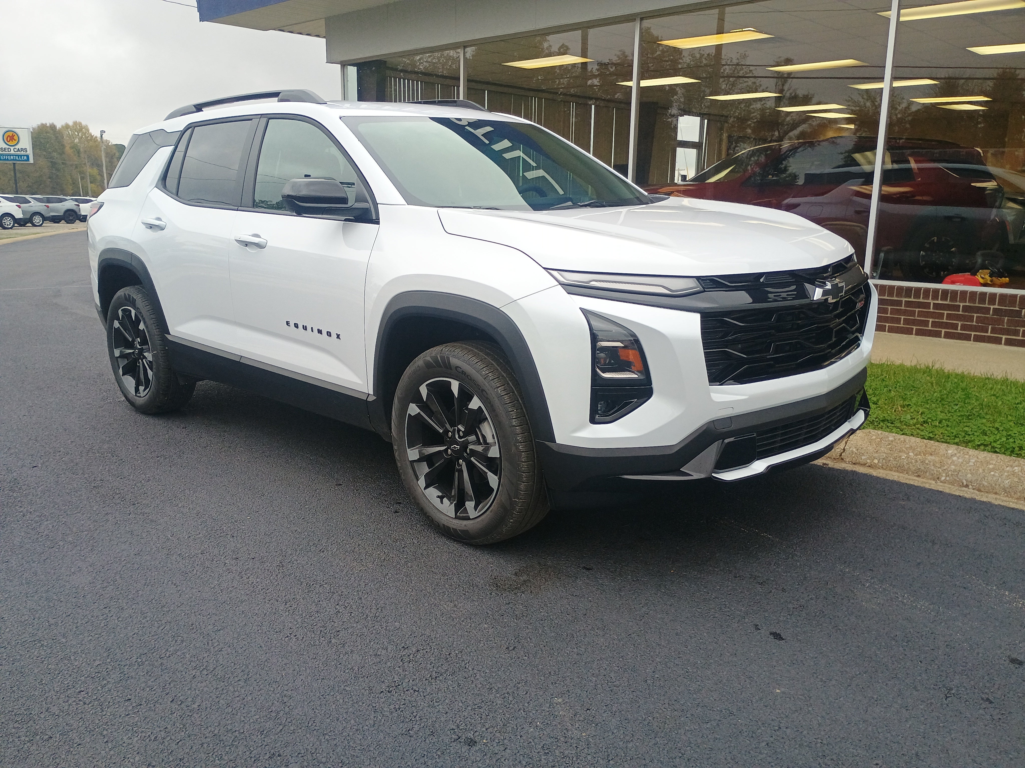 2026 Chevrolet Equinox RS in Polar White Tricoat — front three-quarter view