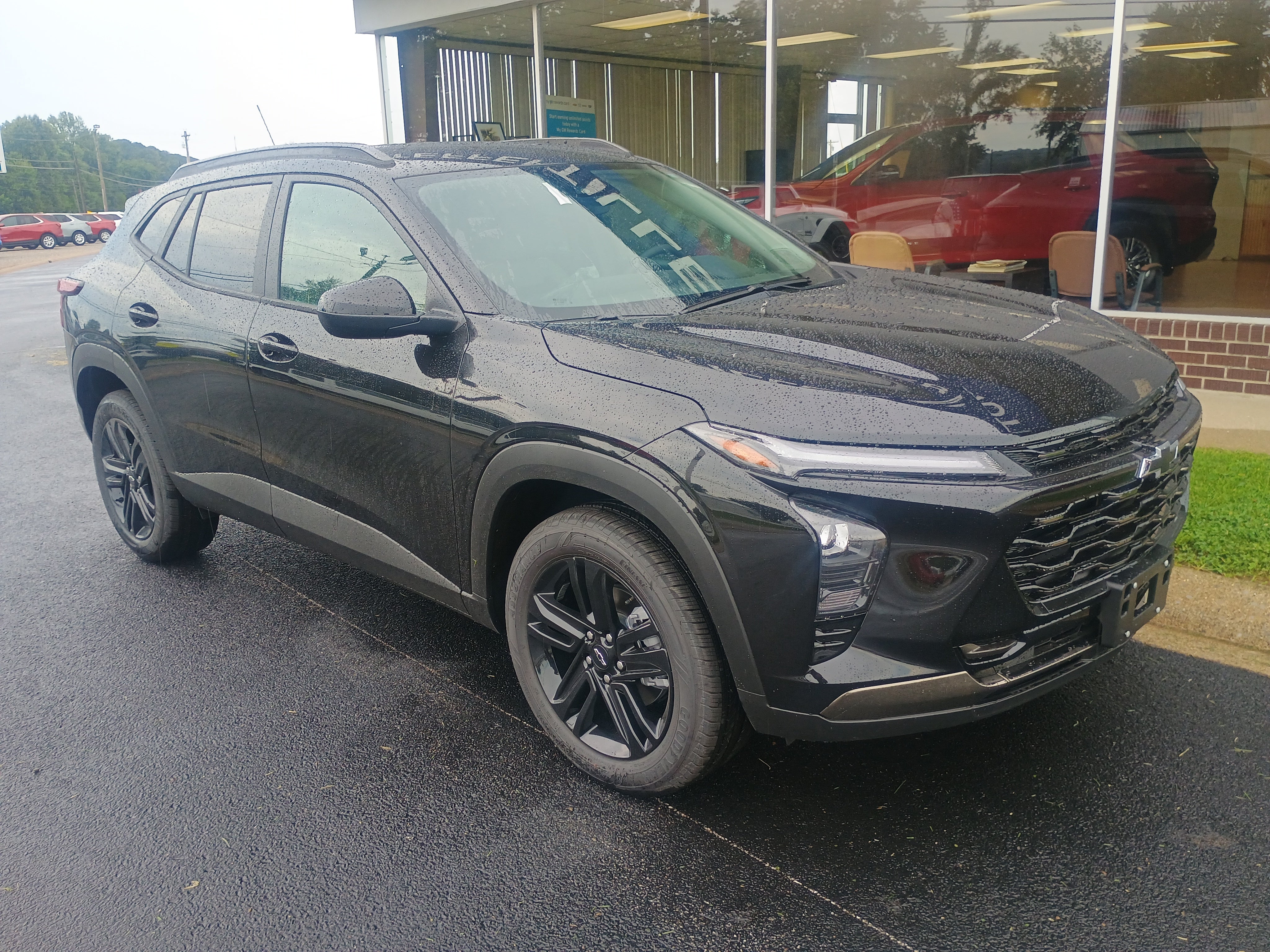 2026 Chevrolet Trax ACTIV in Mosaic Black Metallic — front three-quarter view