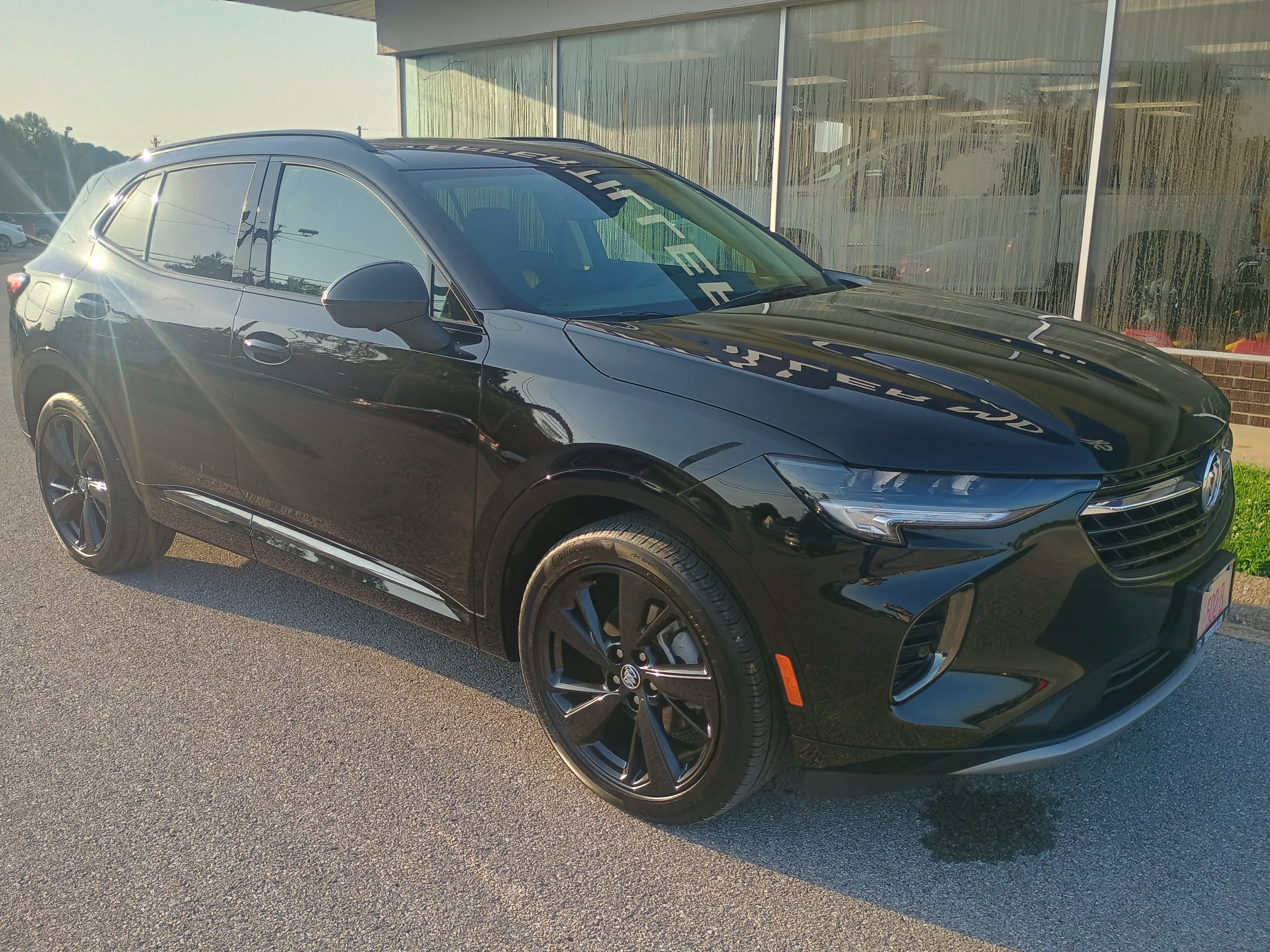 2023 Buick Envision Essence in Ebony Twilight Metallic — front three-quarter view